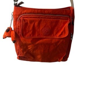 Kipling Orange Red Crossbody Bag with Monkey Charm